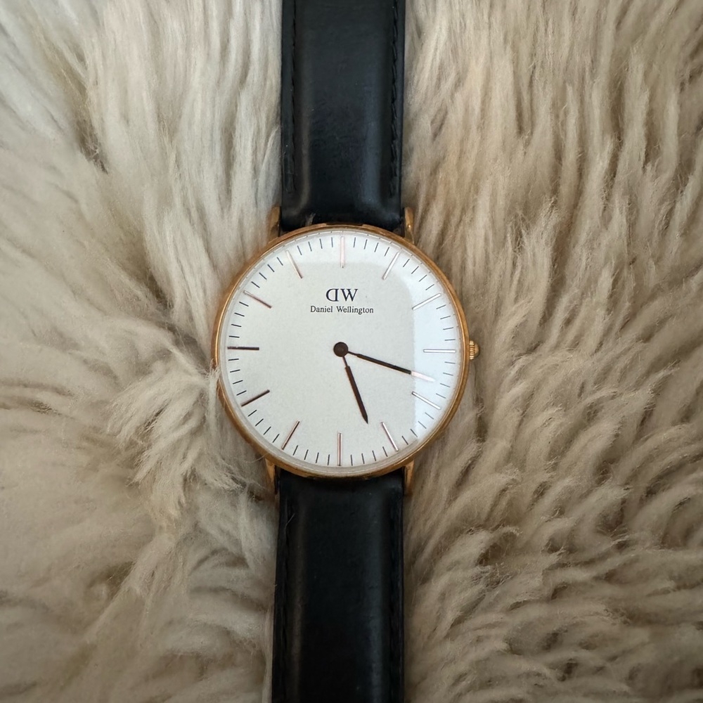 Daniel Wellington | Large dial rose gold watch with black leather band
